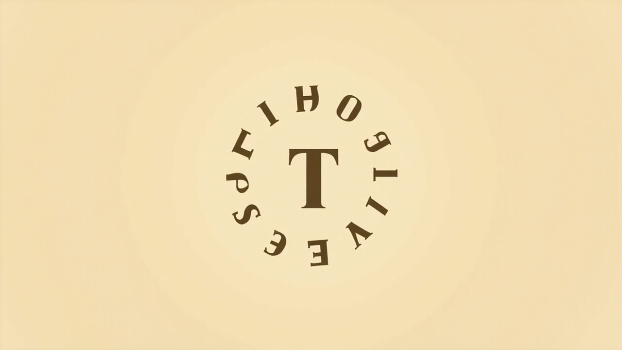 Imagen generada por IA con el prompt: Symmetric letters arranged in mirror fashion around a central T, minimalist editorial typography on a soft beige background, no faces, no logos.